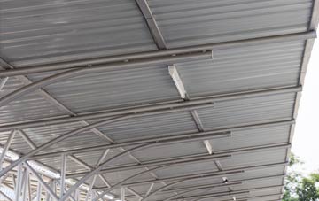 installing Tomich metal roofing