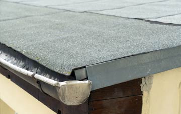 repair or replace Tomich flat roofing?